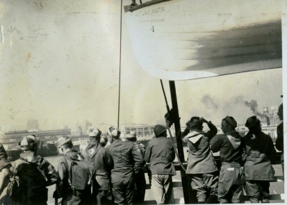 Scouts on Cazadero ferry heading to Northwestern Pacific terminal in Sausalito. Scouts are wearing their Royaneh neckerchiefs and beanies.  c 1927